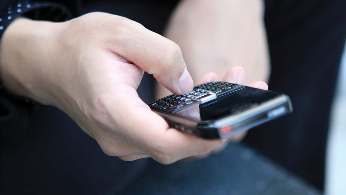 texting-cellphone texting on a cell phone