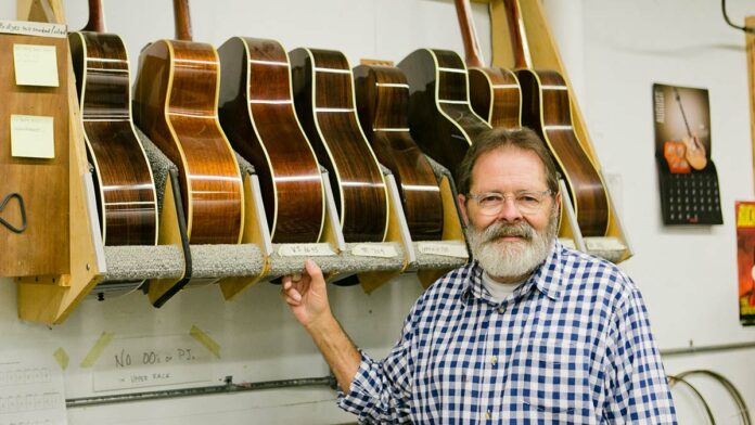 Opinion September 14, 2016 Santa Cruz Guitar Company owner with guitars