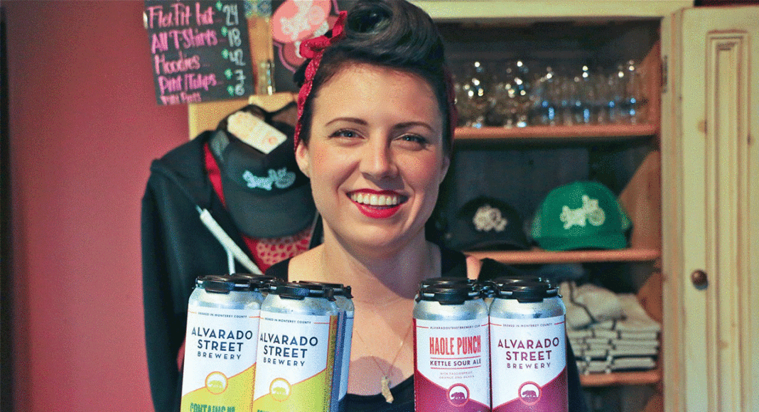 Alvarado Street Brewery brewer Brittany Hobbs holds cans of beer