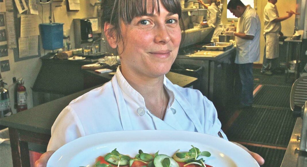 Chef Katherine Stern of La Posta with a starter of house-cured king salmon.