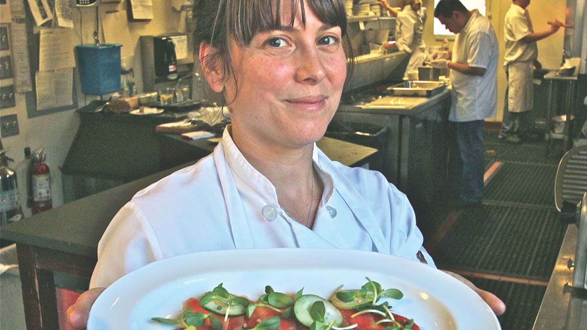 Chef Katherine Stern of La Posta with a starter of house-cured king salmon.