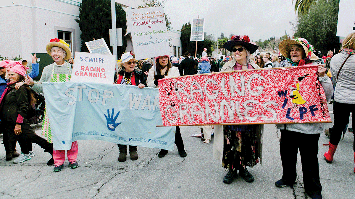 Jan Harwood with Raging Grannies activists protest at Santa Cruz Women's March