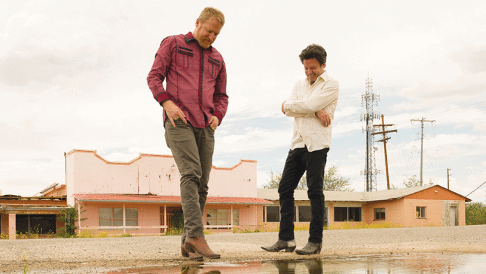 Opinion December 27, 2017 Members of the band Cracker in front of abandoned store front