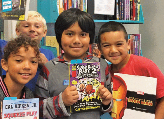 Six Educational Nonprofits Partner with Santa Cruz Gives Live Like Coco gives books to kids on their birthdays