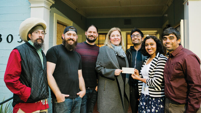Karma Khana: The Pop-Up with Good Karma Karma Khana presents Anissa Novak of the Walnut Avenue Family & Women's Center with a $900 check. Left to right: Allen Laine, Ross Albert, Sean McGowen, Novak, Amit Khatri, Kavya Iyer and Varun Raghavan.