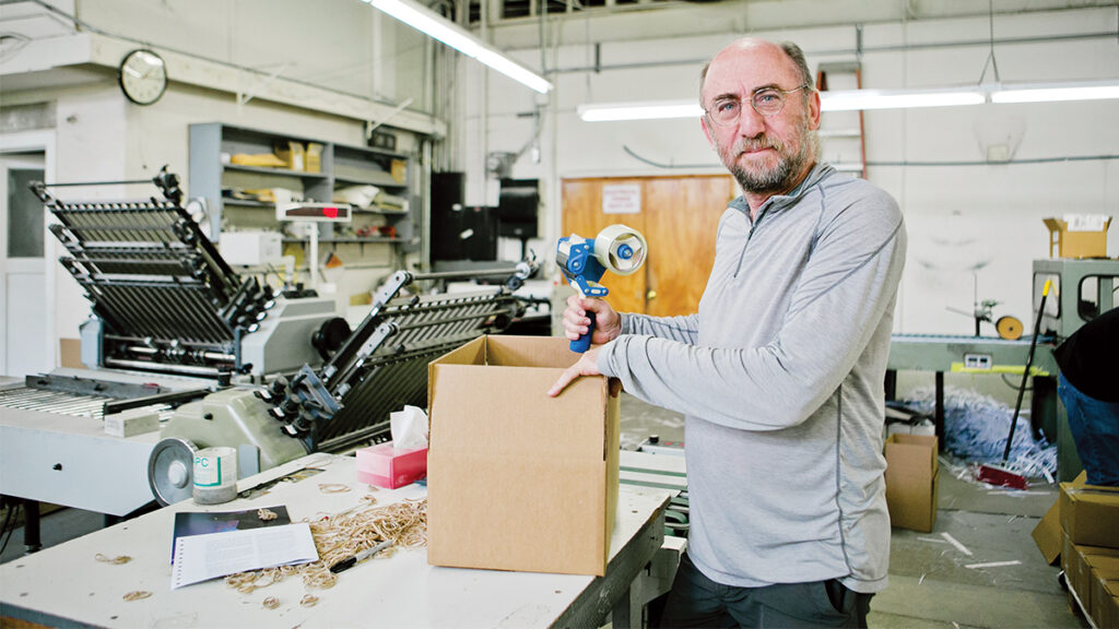 Ross Newport, sales manager for Community Printers, a Santa Cruz business