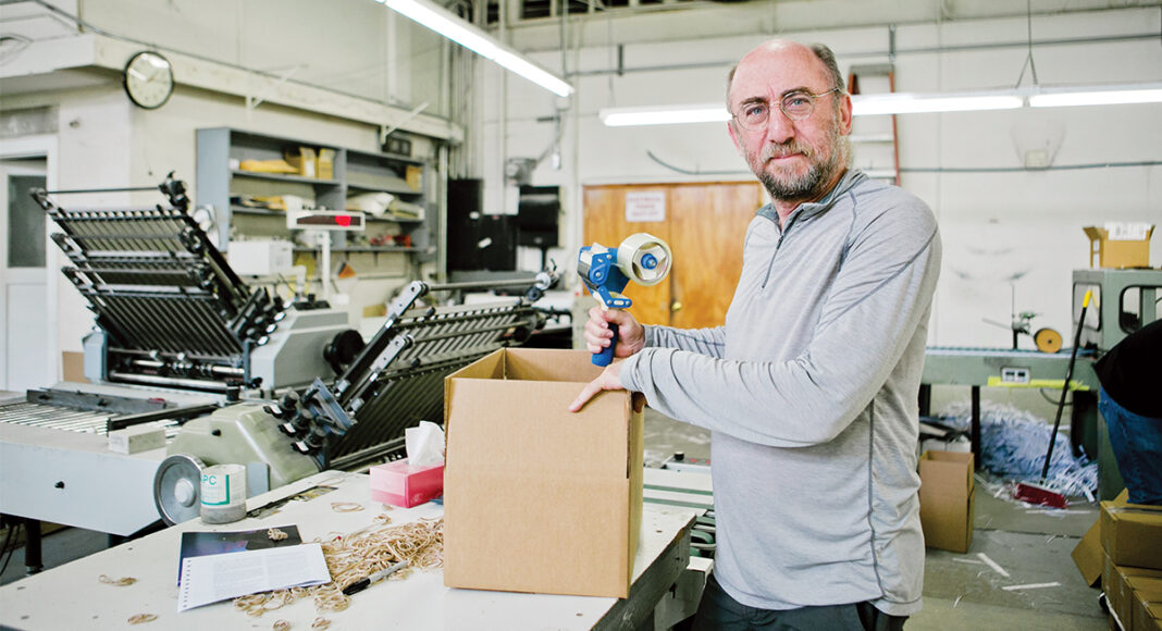 Ross Newport, sales manager for Community Printers, a Santa Cruz business
