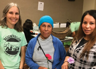 Anxiety in South County Over Climate Change Impacts climate change impacts, Nancy Faulstich, coordinator of the ‘Regeneración: Climate of Hope’ study, stands with two local farm workers at an unveiling of the climate change data in Watsonville.