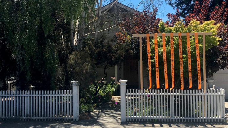 Artists Organize Ribbon Installation to Express Community Grief