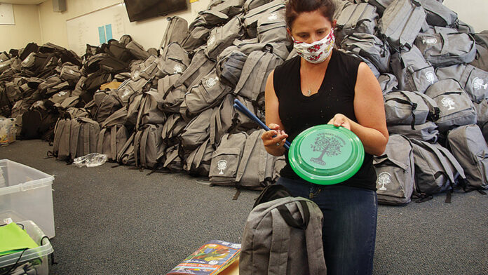 Extended Learning Program Provides Thousands of Bags to Students