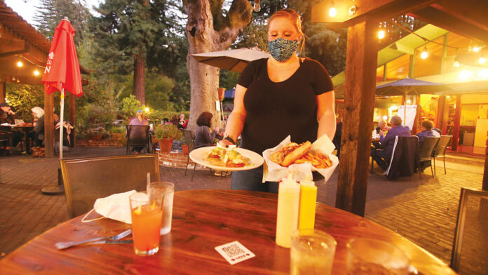 Iconic Cowboy Bar and Grill Hangs Tough Amid Covid-19 and Fires