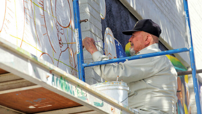 Outdoor Mural at La Manzana Center Gets New Life, Larger Footprint
