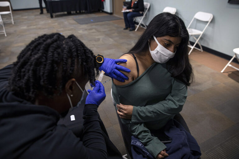 As Omicron Spreads, Officials Ponder What It Means to Be ‘Fully Vaccinated’