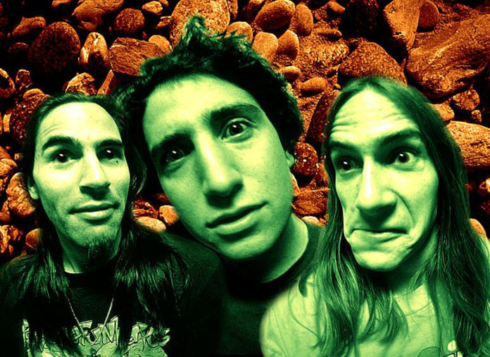 Up From Underground: The IUMA Story Distorted, green-tinged faces against a brown background