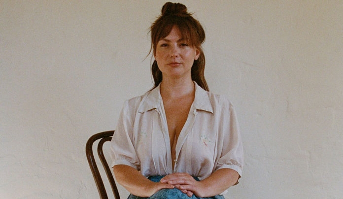 Things To Do In Santa Cruz singer Angel Olsen seated for a full-face photo portrait