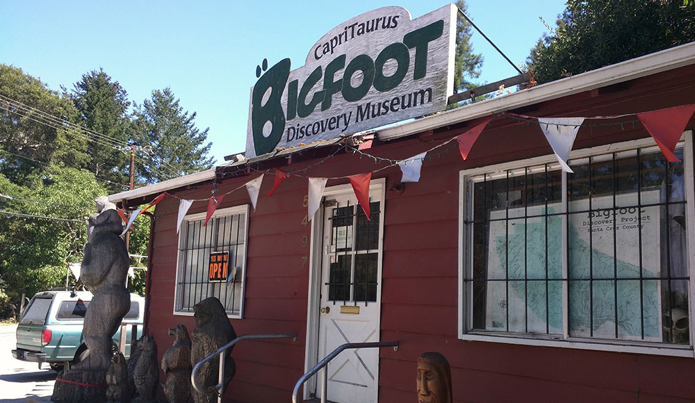 Facade of an old-fashioned buiilding with a sign that says Bigfoot Discovery Museum