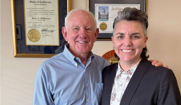 McPhersonโs Legacy Man and a woman in an office