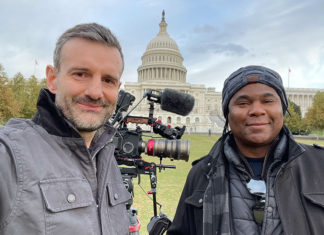 Housing Matters Hosts Screening at the Rio Two men standing in front of the Capitol building