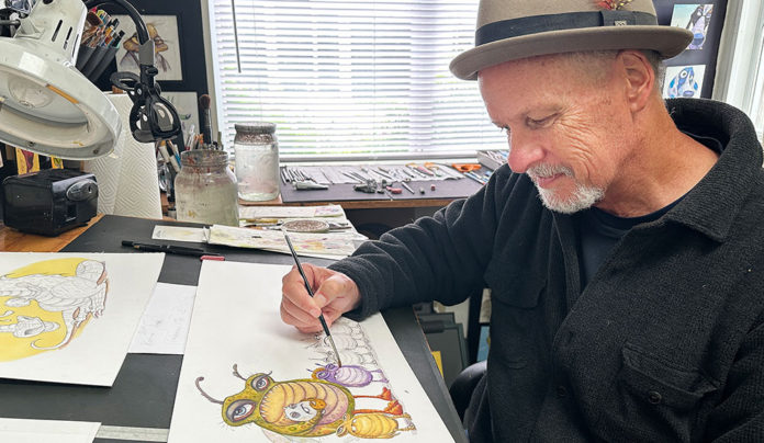 Best of Santa Cruz County 2025: Arts & Culture Man working on an illustration