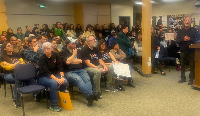 PVUSD Trustees Revisit Budget Speaker at podium and people in the audience