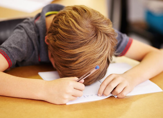 Cuts to USDA Grants Will Hurt Both Education and Agriculture Child leaning face down on a desk