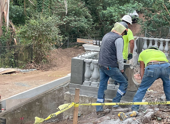 Landmark Park Workers outside a building