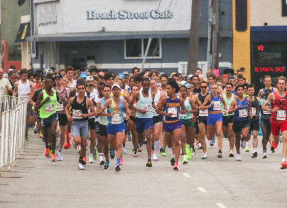 Where to Find Wharf to Wharf Race Participants This Year Runners getting ready to start a raice on a city street