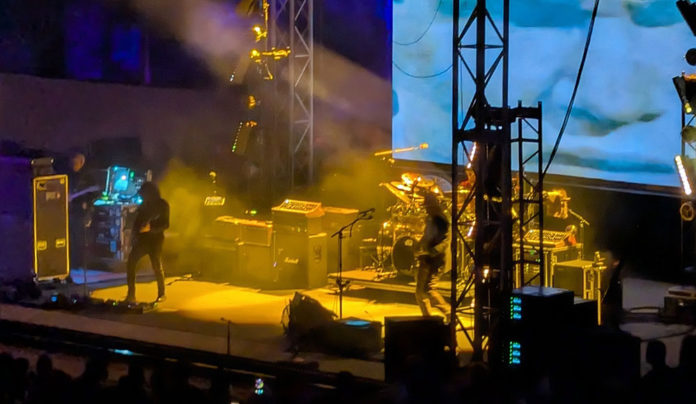 Primus Plays Their Debut at UC Santa Cruz’s Quarry Musicians on a stage as seen from the audience