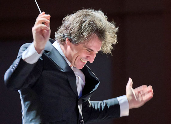 Words and Music performance feature photo of Santa Cruz Symphony conductor