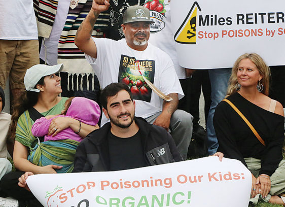 Activist Begins Monthlong Hunger Strike to Protest Pesticide Use Group of people protesting pesticide use