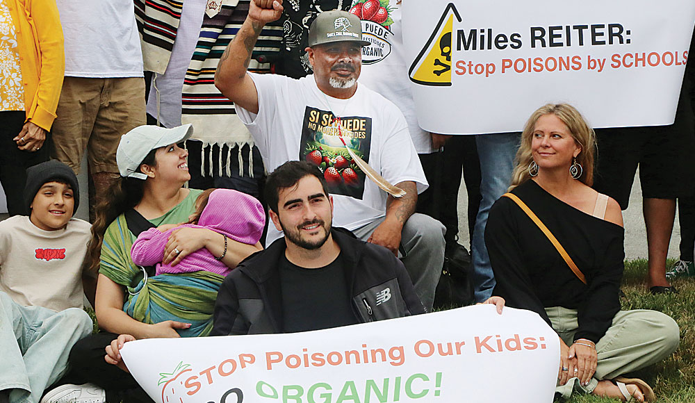Group of people protesting pesticide use
