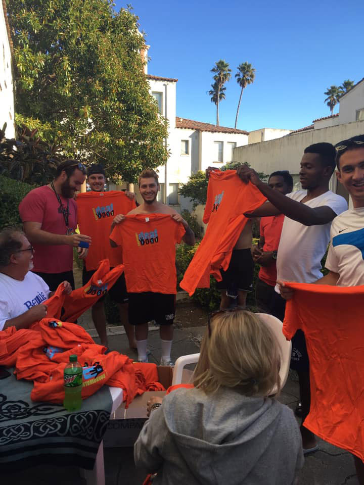 Work and Travel assistants showing the La Bahia b-ball team their new ‘uniforms.