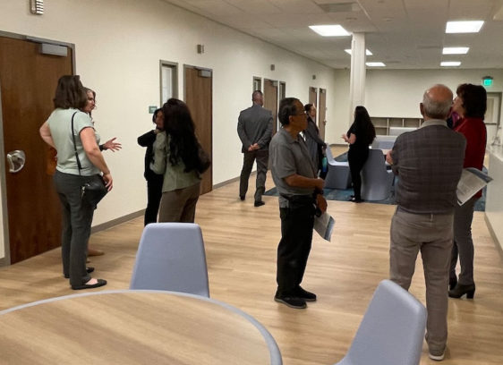 County Unveils Center for Youth in Crisis People inside a building at a press event