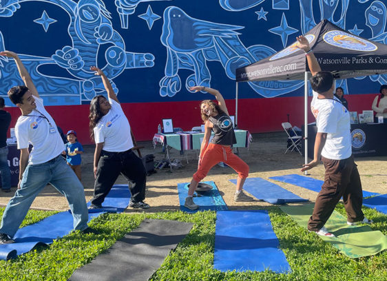 Restorative Yoga practicing yoga depicted with Yoga For All wellness story