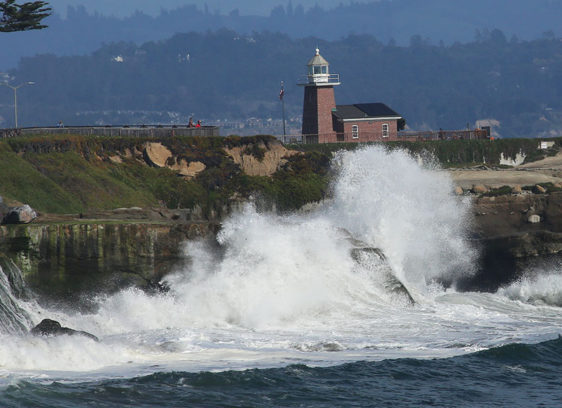 waves crashing against Lighthouse Point