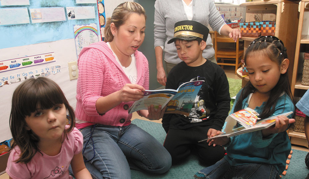 Teacher with young students