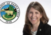 County Taps Nicole Coburn as New CEO woman-next-to-santa-cruz-county-seal-logo