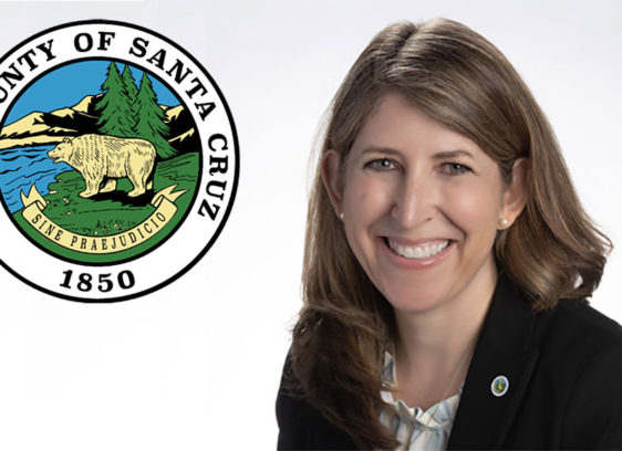 County Taps Nicole Coburn as New CEO woman-next-to-santa-cruz-county-seal-logo