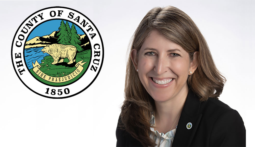 woman-next-to-santa-cruz-county-seal-logo