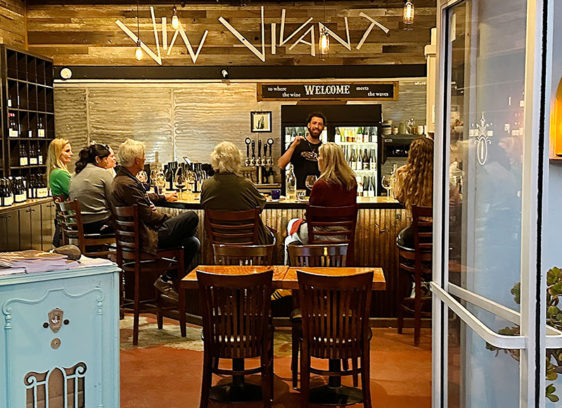 Bon, Vin Vivant! Vin Vivant patrons at the bar