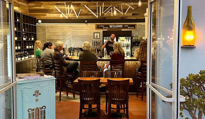 Bon, Vin Vivant! Vin Vivant patrons at the bar