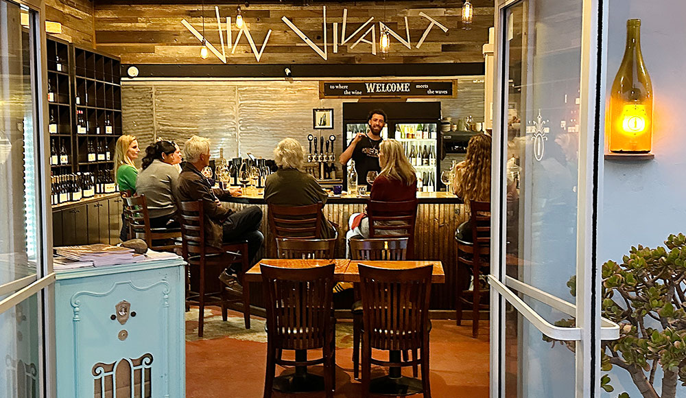 Vin Vivant patrons at the bar