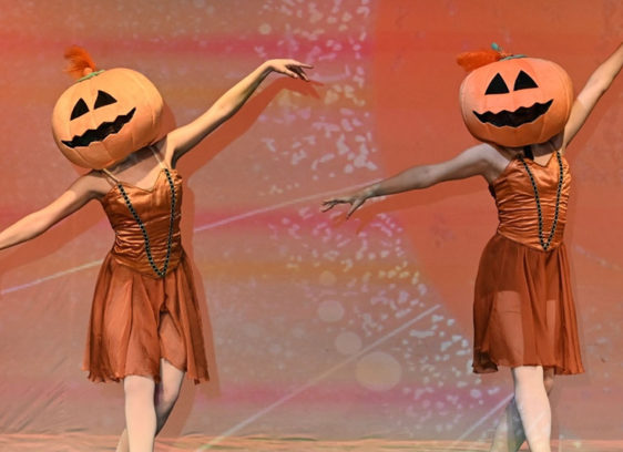 Scare Tactics Nicole Tripier and Violet Young play a pair of pumpkins in ‘Nightmare Before Christmas.’