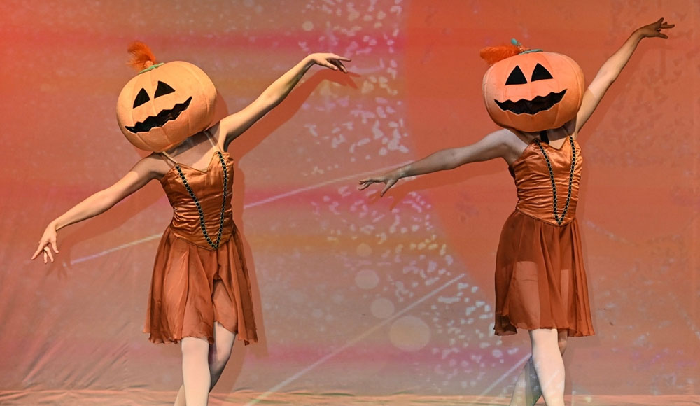 Nicole Tripier and Violet Young play a pair of pumpkins in ‘Nightmare Before Christmas.’