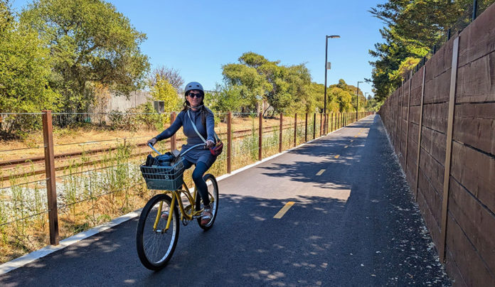 Pedal and Mettle dining review image of a woman on a bike
