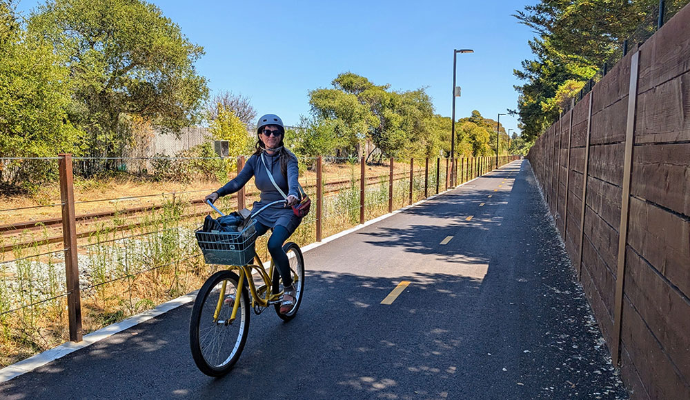 dining review image of a woman on a bike