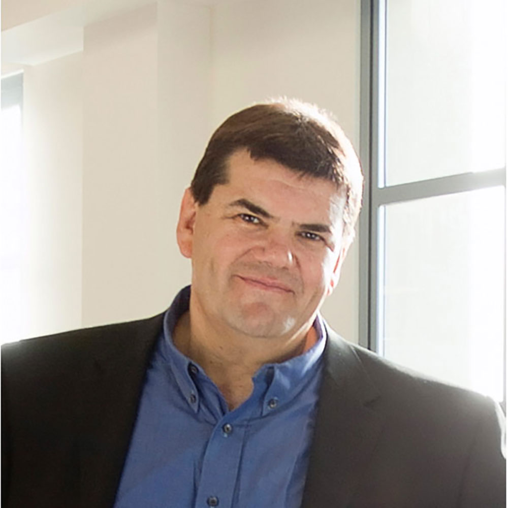 Man photographed by a window