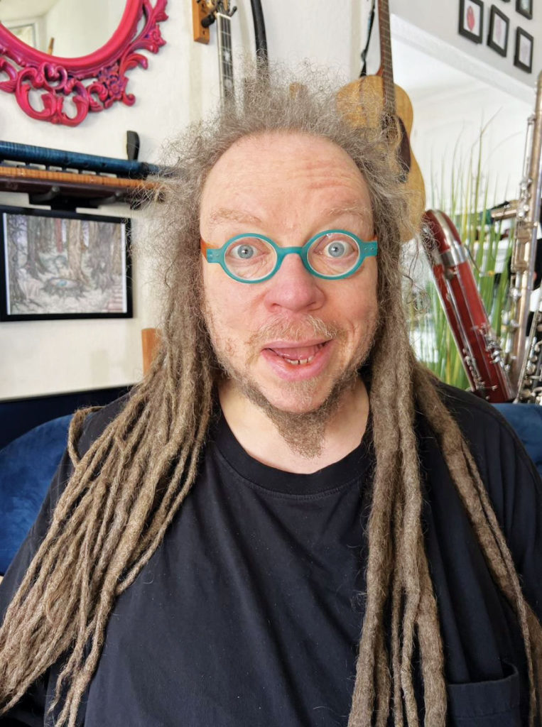 Man wearing glasses photographed indoors