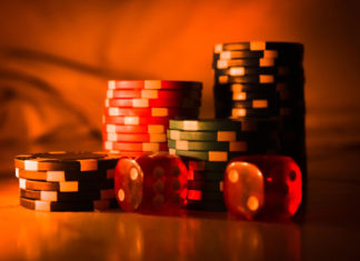 Hard Rock Hotel & Casino Tejon Moves Toward Grand Opening as Construction Advances Casino poker chips and dices on a table