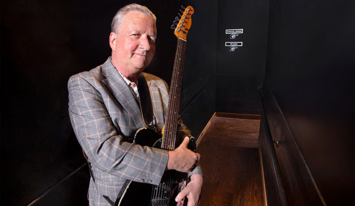 Squeeze Play Squeeze founding member Glenn Tilbrook with guitar